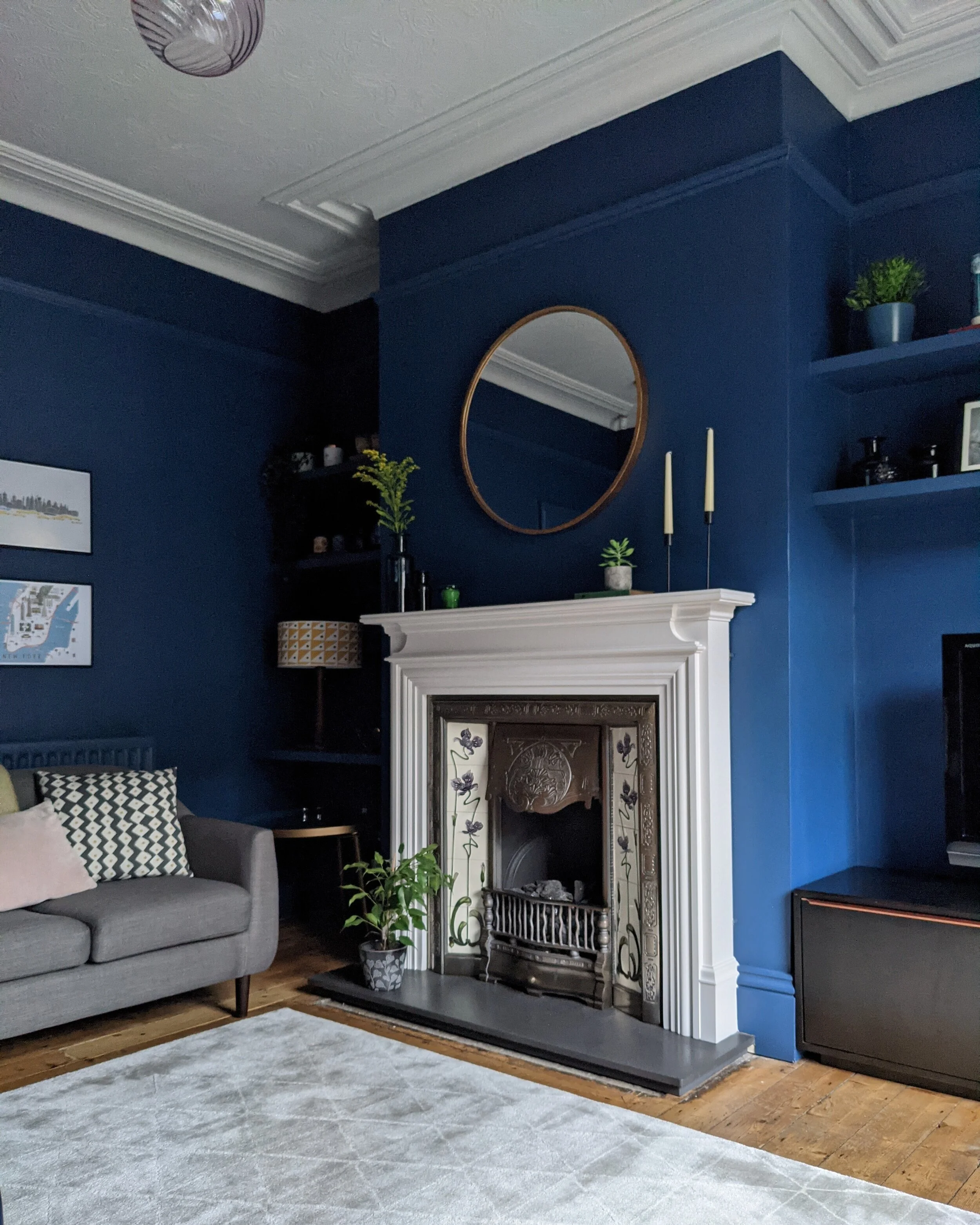 Grey sofa blue sales rug